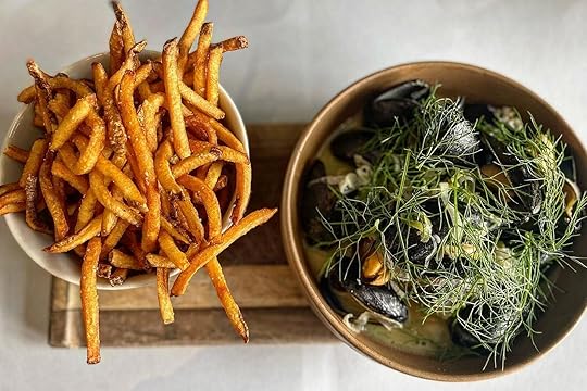 Fries and salad at Annette one of the best things to do in Denver