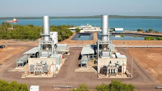 photo from a height of a power station with the sea in the background