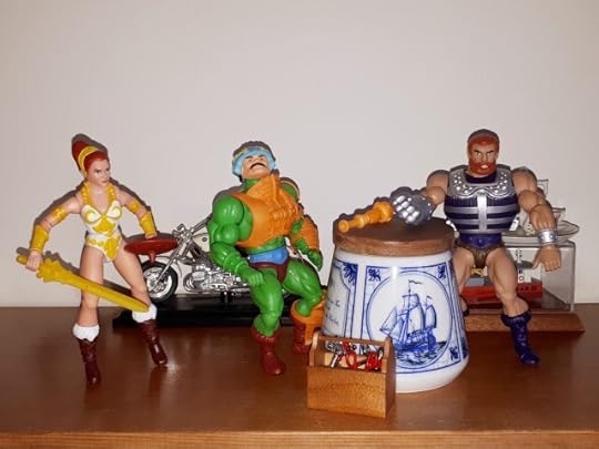 Teela enters Duncan's workshop.