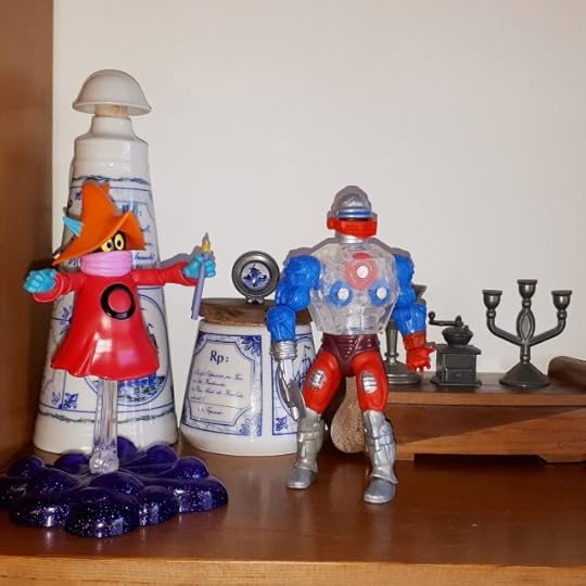 Orko and Robot look after Teela.