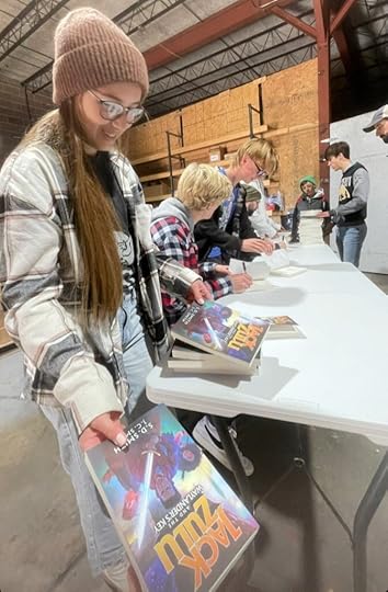 Signing Jack Zulu books