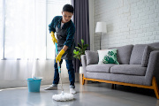 Man mopping floor