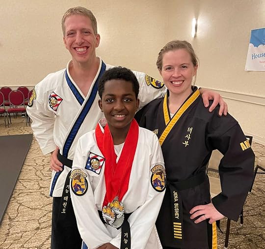 Milo Hendricks with his instructors, Jena Bushey and Jack Smail