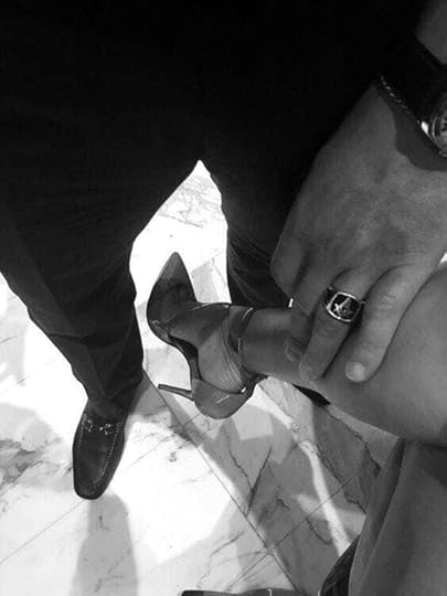 May be a black-and-white image of 1 person and footwear