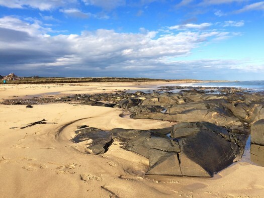 rocks and shadows and light at the beach