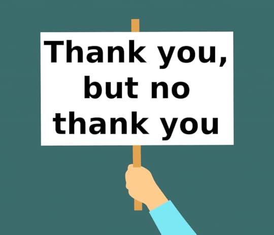 hand holds a sign saying 