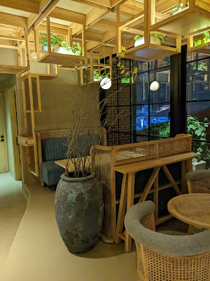 Minimalist interiors with wooden ceilings at Omo Galleria