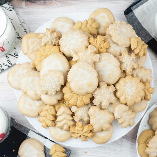 Gingerbread Spritz Cookies on a cake stand.