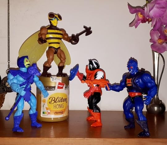 Buzz-Off defends the honey against Skeletor, Stinkor and Webstor
