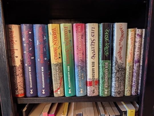 The Rivers of London series of books by Ben Aaronovitch sitting on a shelf.