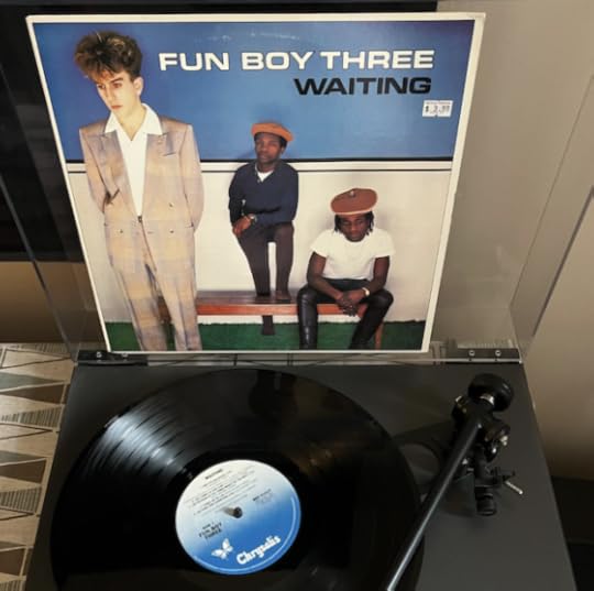This is a photo of the debut album by Fun Boy Three, Waiting, playing on my turntable