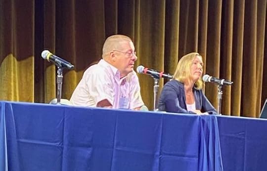 John Robinson and Meredith Sadoulet speaking at Villanova conference