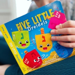 https://thebabybookworm.com/2022/12/20/five-little-dreidels-jeffrey-burton/