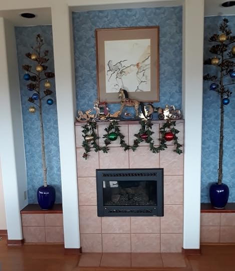 Fireplace mantle decorated for Xmas 2022