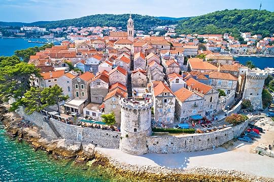 The walled city of Korcula on Korcula Island, with red tiled roofs, where people go for day trips from Dubrovnik