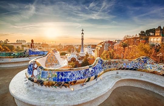 A view of Barcelona Spain, a family friendly travel destination, from a park at sunset 