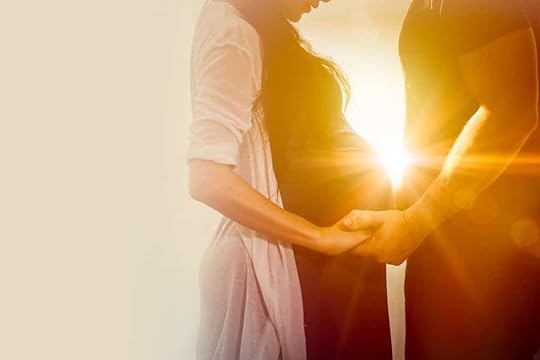 A pregnant couple enjoys one of the dreamiest babymoon destinations in Europe