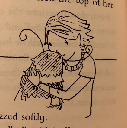 a drawing of Saffron the Yellow Fairy hugging a bumblebee named Queenie. Saffron has cropped blonde hair and a yellow top