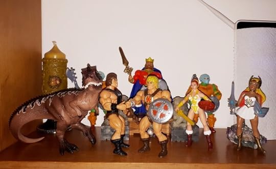 He-Man and Wun-Dar shake hands, while King Randor, Teela and She-Ra look on.