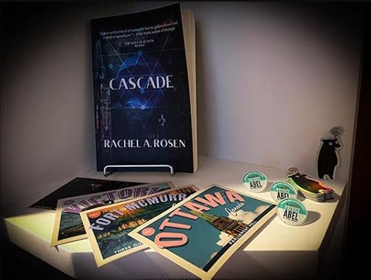 Sleep of Reason swag featuring postcards, pin, and sticker