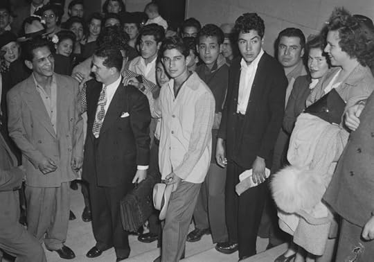 Defendants in the Sleepy Lagoon murder trial are reunited with family and friends in the Los Angeles Hall of Justice following their acquittal, 2 Oct 1944 (public domain via Charles E. Young Research Library, UCLA, via Wikipedia)