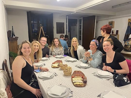 group travel, travelers sitting at a table with charcuterie boards
