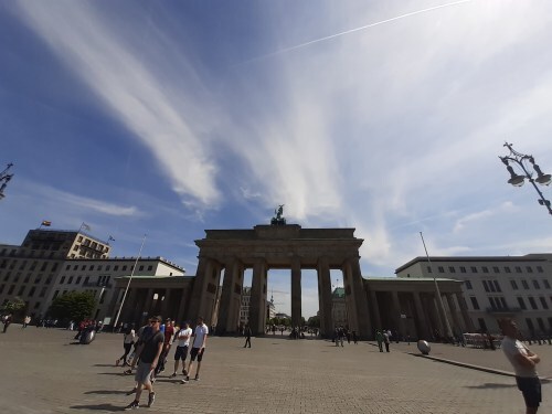 view of the Brandenburg Gate with dramatic sky
