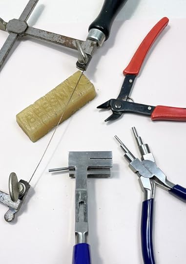 Jewelry making tools used to make jump rings