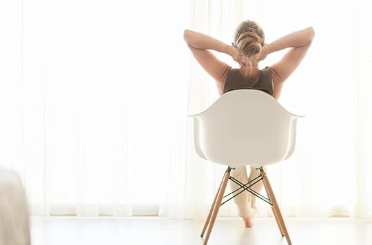 woman relaxing in chair; grief exhaustion: 7 ways to rest