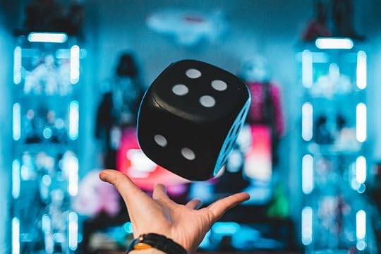 throwing a big die - a symbol for randomness