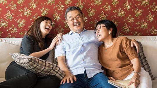happy family sitting on couch