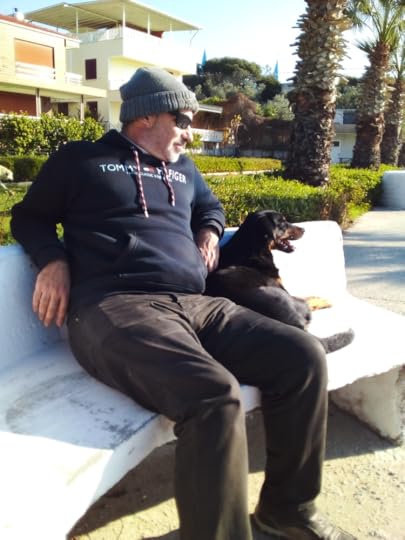 Maximilian Sam and Izzy sat on a bench by the beach