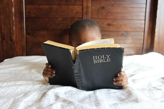 Boy reading Bible