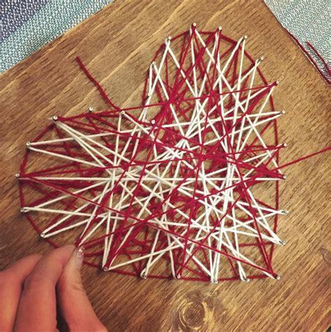 Hammer the nails into the wooden board along . heart string art template pattern crafting design etsy