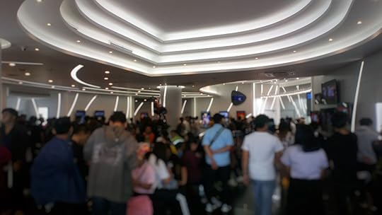 people in line for a movie showing