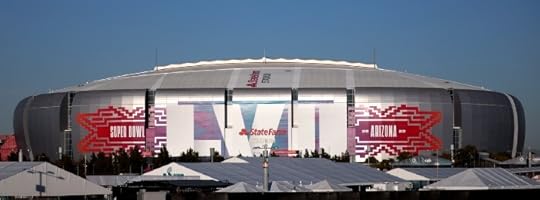 Image shows outside of the football stadium in Arizona where Superbowl fifty-seven was played.