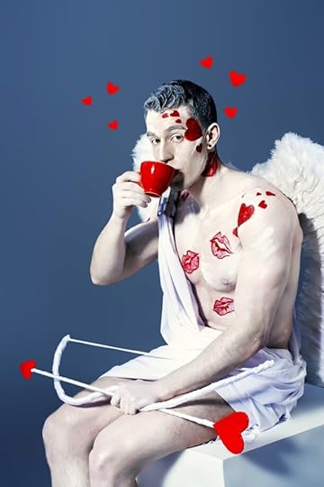 A man dressed like cupid.