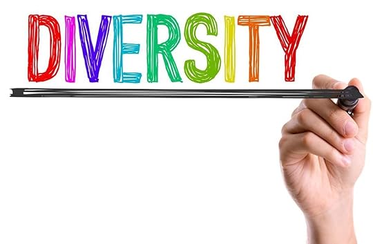 The word DIVERSITY is spelled out in rainbow colours. A hand holding a black marker underlines the words.
