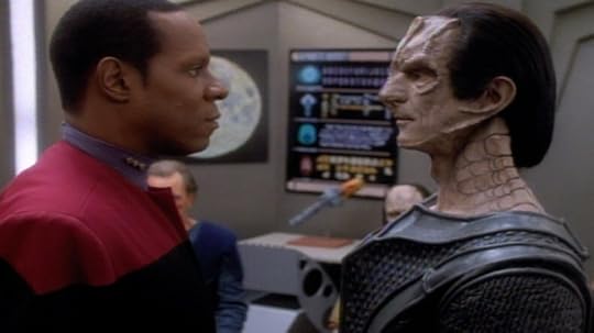 Captain Sisko and Dukat stand toe-to-toe in Stark Trek DS9