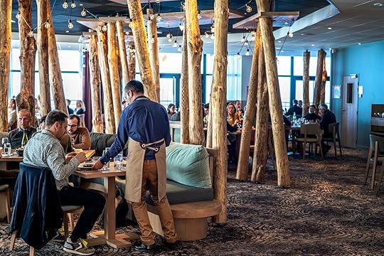 people dining at club med tignes in the french alps