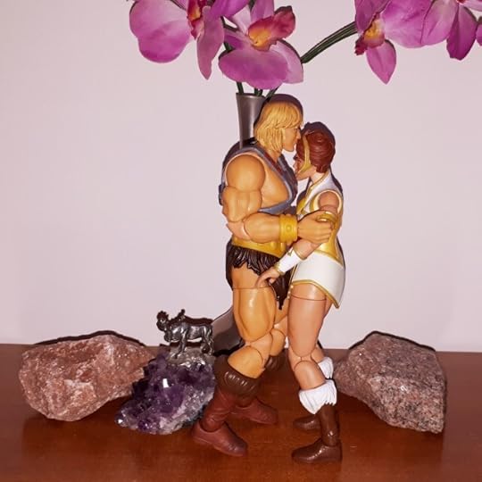 He-Man and Teela are kissing.