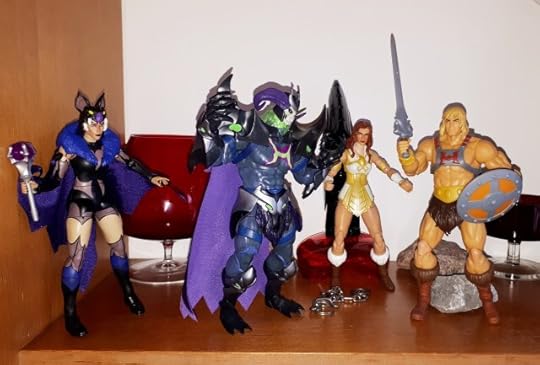 He-Man hacks through the chains and frees Teela.
