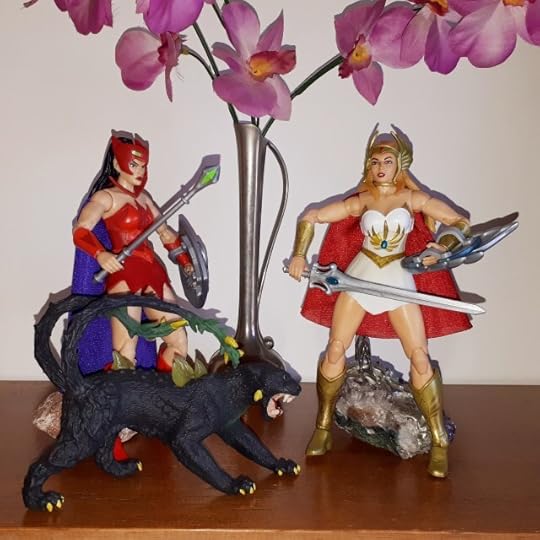 She-Ra lowers her weapon.