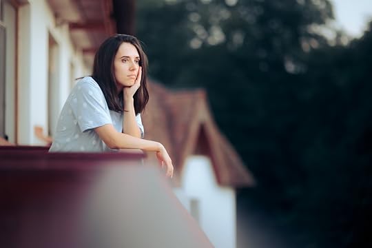 Sad Melancholic Woman Sitting in the Balcony.