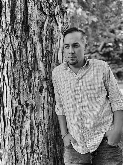 Picture of the American Christian Fiction Writer T.K. Chapin by tree