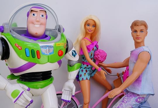 Buzz Lightyear, Barbie and Ken toys.