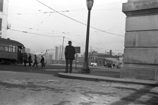 Man-standing-on-corner-630-am-everett