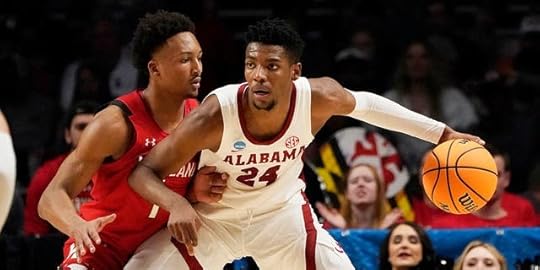 Alabama forward Brandon Miller (24) is guarded by Maryland guard Jahmir Young (1) in the first half of an NCAA Tournament second-round college basketball game in Birmingham, Alabama, on Saturday March 18, 2023.