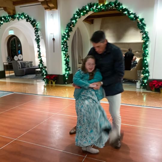 photo of Penny dancing with her dad in a ballroom