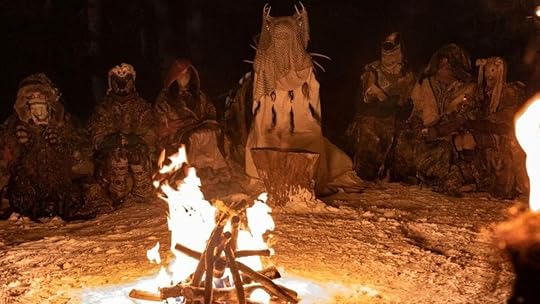 Yellowjackets Antler Queen and team by the fire as they prepare for cannibalism